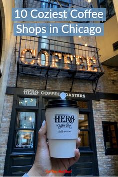 a person holding up a coffee cup in front of a building with the words, 10 coziest coffee shops in chicago