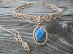 Labradorite Lace Macrame Choker, Wedding Hippie Bohemian Necklace, Bride to be Tribal Hippie Gemstone Jewelry This lovely hippie style choker is created using the macrame technique. It is made by a high quality tan waxed thread and Labradorite cabochon. Also, we use a  brass beads to complete design.  Waxed thread gives the product durability and strength, and elegant natural appearance.  It's a beautiful gift and a nice accessory what you can wear every day.  Necklace/Choker characteristics: *This necklace is adjustable, with a sliding knot, so matched to any width of the neck. *Rainbow Moonstone cabochon size is 30 x 20 mm  *Brass beads size is 4 mm and 2 mm *No color fading --------All items made with a lot of dedication, patience and love. --------Necklace will arrive nicely packaged i Adjustable Bohemian Necklaces For Weddings, Bohemian Adjustable Necklaces For Wedding, Adjustable Bohemian Jewelry For Wedding, Adjustable Bohemian Wedding Jewelry, Macrame Choker, Brass Beads, Labradorite Cabochon, Bohemian Necklace, Macrame Necklace