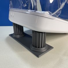 a white and black object sitting on top of a table