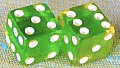 two green dices with white dots on them