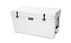 a white yeti cooler with black handles