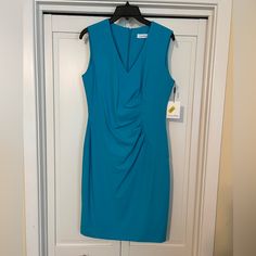 Nwt Calvin Klein Dress. Blue Ruched Dress For Work, Calvin Klein Fitted V-neck Sleeveless Dress, Calvin Klein Fitted Sleeveless V-neck Dress, Elegant Calvin Klein Sleeveless V-neck Dress, Elegant Blue Calvin Klein Dress, Calvin Klein Blue Formal Dress, Calvin Klein Blue Midi Length Dress, Calvin Klein Blue Sheath Dress, Calvin Klein Blue Midi Dress