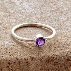 Beautiful handmade faceted amethyst gemstone sterling silver ring. The ring is polished to a bright and shiny finish. The back of the bezel is open allowing light to pass through the gem.  Amethyst is the birthstone for Pisces and the month of February. Amethyst is also the traditional gemstone you give for your 6th wedding anniversary gift to her. It is said to strengthen relationships and give its wearer courage.  The ring will make a perfect gift for yourself or your loved one. It looks lovel 6th Wedding Anniversary, Ring Birthstone, Wedding Anniversary Gift, Ring Gemstone, Amethyst Gemstone, Beautiful Gift Boxes, Amethyst Ring, Birthstone Ring, Wedding Anniversary Gifts