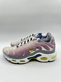 Elevate your sneaker game with these Nike Air Max Plus in Violet Dust/High Voltage. The high top shoe shaft style and synthetic upper material provide added support and style. The shoe width is medium and the US shoe size is 6. These sneakers are perfect for any athletic occasion with their high-quality design and comfortable fit. The product line is Wmns Nike Air Max Plus and the style code is FN8007 500. Don't miss out on this opportunity to add these stylish shoes to your collection. High Top Shoe, Sneaker Games, Air Max Plus, Nike Air Max Plus, High Voltage, Stylish Shoes, High Quality Design, Top Shoes, High Top