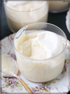 two bowls filled with pudding on top of a floral plate