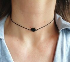 "Simple, chic, black tourmaline choker necklace; Tiny black cord choker to compliment a casual outfit; It's so fun to wear it everyday :) One rectangular raw black tourmaline crystal ; Stainless steel (non tarnish) lobster claps closure. Waterproof necklace, can be used in the water. Custom made lenght. Need another size? Please feel free to leave a message. Model wears 14\" length. Ready to give as a gift, this necklace comes wrapped in a nice jewelry pouch. Please notice that the pictures are Trendy Adjustable Black Choker, Trendy Black Adjustable Choker, Black Minimalist Jewelry With Adjustable Cord, Minimalist Black Choker As A Gift, Trendy Black Choker For Gift, Casual Black Choker Jewelry, Black Casual Necklace With Adjustable Cord, Casual Black Necklace With Adjustable Cord, Trendy Black Jewelry With Adjustable Cord