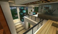 the interior of a modern house with wood flooring and plants on the windows sill