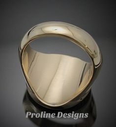 Made entirely in the U.S.A. Ring Details~ Bold - Handsome - Exquisitely Finished - Original The newest addition to our Prestige Collection, this gold version of our moral compass ring is sure to stand out. The top prominently features the square and compass with the four directions around the outer edge. The side windows display the symbolic trowel and level on a textured background. Hand finished to perfection, the high polish creates a contrast against the sandblasted background. All creations Modern Yellow Gold Collectible Rings, 14k Gold Signet Ring With Polished Finish, Classic Polished Collectible Jewelry, Modern Gold Rings With Engraving Option, Timeless Engraved Ring With Polished Finish, Timeless Polished Jewelry For Collectors, Timeless Polished Engraved Ring With Round Cut, Polished Finish Round Signet Ring Collectible, Polished Round Signet Ring Collectible