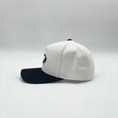 Elevate your look with the INV Staple Logo Snapback from Invincible Exclusives in our White / Black colorway. Style, luxury, and confidence in every thread. White canvas, black brim, black and white embroidery Signature stars on side Snapback closure Custom interior lining and tag 100% made from scratch Designed in Detroit Embroidery Signature, Black And White Embroidery, Custom Interior, Made From Scratch, White Embroidery, Elevate Your Look, White Canvas, From Scratch, White Black