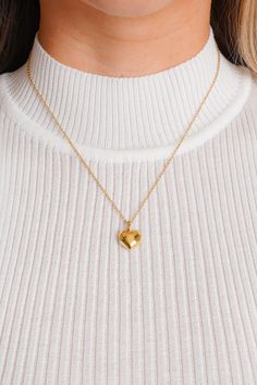 Add some love to your look with our Cherished Heart Necklace. Featuring an 18K gold plated chain and a unique geometric heart pendant. It is 18" long and has a 2" chain extender so you can adjust the length to your liking. This necklace is perfect for adding a touch of elegance to any outfit or could be the perfect gift for a special loved one. Pair with our cherished heart earrings! Heart-shaped Gold Chain Necklace For Gift, Valentine's Day Gold Chain Heart Necklace, Valentine's Day Gold-tone Heart Necklace Gift, 14k Gold Heart Pendant Chain Necklace, Tarnish Resistant, Anastasia Dress, Valentine's Day Gold-tone Heart Pendant Necklace, Velvet Purse, Perfect Gif, Geometric Heart