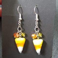 Candy Corn Halloween Earrings With A Little Bling. Measurements 55mm In Length. Price Is 100% Firm. Candy Corn Earrings Diy, Fall Jewelry Diy, Candy Corn Jewelry, Holiday Beaded Jewelry, Halloween Earrings Beaded, Corn Earrings, Candy Corn Earrings, Candy Corn Halloween, Halloween Color