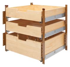 three wooden drawers are stacked on top of each other in the same drawer unit,