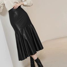 Step out in style with our Trendy High-Waist Black Faux Leather Midi Skirt, designed for the modern woman who appreciates elegance and sophistication. This regular fit skirt features a high rise design that flatters the waist and creates a slimming silhouette, making it a versatile addition to your wardrobe for spring and fall.Crafted from high-quality polyester faux leather, this skirt offers a chic and polished look without compromising comfort. Its solid pattern provides endless styling options, allowing you to dress it up for formal occasions or keep it casual for everyday wear. Pair it with a tailored blouse for a professional look or a stylish top for a night out.Key Features: Style: Elegant and trendy for versatile dressing Fit: Regular for a comfortable fit Fabric: High-quality pol Curvy Boho, Crisp White Blouse, Faux Leather Midi Skirt, Vintage Denim Skirt, Unique Skirts, Black Leather Skirt, Sheath Skirt, Formal Wear Dresses, Trendy Skirts