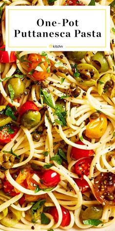 one pot pasta with tomatoes, olives and other ingredients in a white bowl on top of a wooden table