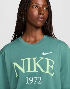 Top by Nike The foundation of your outfit Crew neck Short sleeves Nike print to chest Oversized fit Formal Dresses Graduation, Cocktail Dress Formal, Green Shop, Nike Classic, Winter Party Dress, Long Sleeve Floral Dress, Satin Slip Dress, Active Wear Leggings, Lingerie Romper