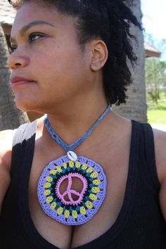 Handmade crochet necklace/Choker in Denim and with Peace sign granny (circle) motif and Shell detail. Silver Chain and clasp for back closure. Spring Summer Boho style. Casual/Beach/Statement/Festival/Jewellery 100% Cotton. In Denim. One Size Peacekeeper Mandala Pattern by Starlily Creations (Etsy) Handmade with Love by Kinyonga (Spain). Hippie Style Festival Necklaces, Bohemian Crochet Necklaces For Festivals, Bohemian Crochet Necklace For Festivals, Adjustable Crochet Necklaces For Festivals, Adjustable Crochet Necklace For Festivals, Adjustable Crochet Jewelry For Festivals, Summer Festival Retro Jewelry, Retro Summer Festival Jewelry, Adjustable Crochet Necklaces For The Beach