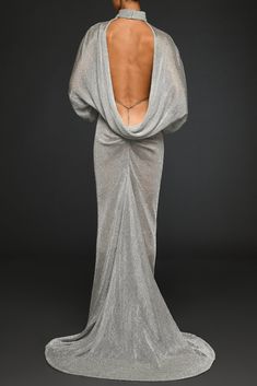 Description Silver Column, Long dress Puffed, Long sleeves Closed neckline Dry Clean Made in Lebanon SKU 600-3-4 Jean Louis Sabaji, Cutout Gown, Bat Sleeves, Dress With Open Back, Mesh Maxi Dress, Bat Sleeve, Grey Dress, Silver Dress, A Mermaid