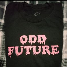 Brand New W/O Tag Tried On But Never Worn Black Odd Future Shirt By Tyler The Creator Size M Unisex Black Slogan Shirt In Grunge Style, Trendy Black Shirt With Letter Print, Trendy Black Shirt With Text Print, Black Text Print Shirt For Fall, Trendy Black Shirt With Graphic Print, Trendy Black Cotton Shirt, Black Edgy Shirt With Text Print, Cool Black Tops With Letter Print, Cool Black Crew Neck Top