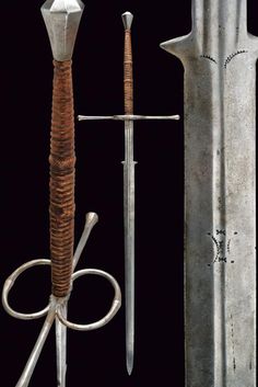 three different types of swords on display