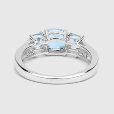 "Blue Topaz Ring, Natural 5 Stone Sky Blue Topaz Cushion Promise Ring, Sterling Silver Ring, December Birthstone Ring Flaunt yourself with this blue & white topaz 3 stone ring. The natural gemstones have a combined weight of 1.98 carats and are set in .925 sterling silver with rhodium plating. The soft blue hue of this ring adds a pop of color to any look! The understated design and vibrant stones make this ring perfect for every occasion. Product Details: Metal: .925 Sterling Silver Gross W Three Stone Blue Topaz Sapphire Promise Ring, Fine Jewelry Blue Topaz Three Stone Ring, Blue Topaz Three Stone Round Ring, Blue Topaz Three Stone Ring For Anniversary, Three-stone Blue Topaz Ring For Anniversary, Blue White Topaz Ring For Promise, Three Stone Blue Topaz Ring For Anniversary, White Gold Three Stone Blue Topaz Ring, Anniversary Three-stone Blue Topaz Ring