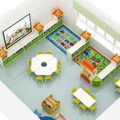 an overhead view of a children's playroom with tables, chairs and television