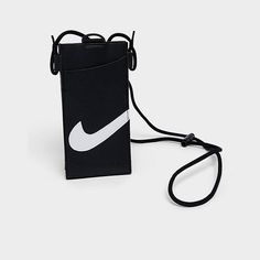 * Phone-sized crossbody with metal hardware and high-contrast Nike Swoosh logo   * Fully adjustable strap for personalized fit and optional styling   * Tech-touch screen for in-bag phone use   * 0.7"W x 7"H x 3.5"D   * 34% nylon/27% PU leather/15% thermoplastic polyurethane (TPU)/12% polyester/7% polyoxymethylene (POM)/5% zinc alloy   * Spot clean   * The Nike Premium Phone Crossbody Bag is imported.  When you're on-the-go and your phone is your sole priority, keep it protected in luxe Swoosh style when you wear this Nike Premium Phone Crossbody Bag. Nike Swoosh Logo, Swoosh Logo, Nike Swoosh, High Contrast, Jd Sports, Metal Hardware, 7 H, Touch Screen, Zinc Alloy