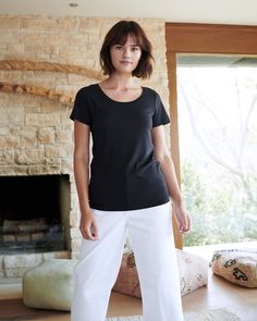 Our soft and stretchy modal cotton blend is wrinkle resistant with a flattering, smooth finish. So, perfect for an easygoing everyday tee.  | Quince | Women's Cotton Modal Crew Neck T-Shirt in Black, Size Medium, Cotton/Modal Quince Tops, White Halter Maxi Dress, Scoop Neck Tee, Asymmetrical Tops, Silk Skirt, Pleated Mini Skirt, Shop Maxi Dresses, Zip Jacket, Crew Neck Tee