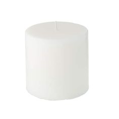 a white pillar candle on a white background