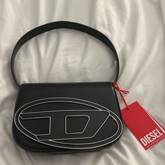 Perfect Condition With Tags, Never Worn, Received As A Gift! Black Designer Satchel Baguette Bag, Designer Black Baguette Pouch Bag, Designer Black Pouch Baguette Bag, Designer Black Baguette Shoulder Bag, Designer Black Baguette Bag With Branded Hardware, Designer Black Baguette Clutch Bag, Diesel 1dr Bag, 1dr Bag, Diesel 1dr