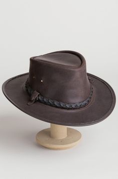 Traveler Crushable Leather Outback Hat | Overland Brown Country Style Hat Band For Outdoor, Country Style Brown Hat Bands For Outdoor, Brown Country Style Outdoor Hat Band, Rustic Wide Brim Hat Bands For Outdoors, Brown Outdoor Country Style Hat Band, Adjustable Rugged Fedora For Outdoor, Adjustable Rugged Brimmed Hat, Flat Brim Hats With Leather Sweatband For Country Events, Rugged Flat Brim Fedora For Ranch