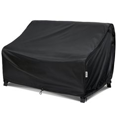 an outdoor grill cover on top of a table