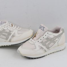 Nos Vintage 90s Asics Womens 7 Spell Out Leather Sneaker Shoes White Unwearable Shoes Never Worn Without Box. Unwearable With Some Yellowing. Cannot Be Worn Meaning If You Wear Them They Will Rip Apart. Collectors Only Womens Size 7 Check Out My Other Items In My Store Vogue Squared! Shoerack Retro Asics Lace-up Sneakers, Vintage Synthetic Sneakers For Sports, Vintage Synthetic Sports Sneakers, Vintage Style Synthetic Sports Sneakers, Vintage Lace-up Synthetic Sneakers, Asics Casual Sneakers For Spring, Casual Asics Sneakers For Spring, Casual Asics Spring Sneakers, Asics Shoes