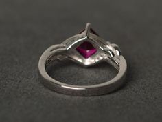 Welcome to my shop, you can find many beautiful gemstone jewelry here, and you also can ask for customized service. Main Stone: lab created ruby, square cut, measures 7X7mm, weight 2.27 carats; Accent Stones: CZ Metal: 925 sterling silver plated with rhodium. I also can provide metal options such as 14k solid yellow/white/rose gold Setting: prong setting My shop home: https://www.etsy.com/shop/XCjewelryStudio?ref=hdr_shop_menu It's a perfect gift for the person who was born in July (Birthstone), White Gold Ruby Ring With Princess Cut, White Gold Princess Cut Ruby Ring, Classic Silver Ruby Ring With Princess Cut, Square Cut Ruby Ring Fine Jewelry, Square Cut Ruby Ring In Red, Square Cut Ruby Ring For Wedding, Silver Princess Cut Ruby Ring For Formal Occasions, Square Cut Ruby Wedding Ring, Formal Silver Princess Cut Ruby Ring