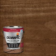 a can of olympic maximum brown paint