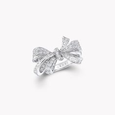 Discover the diamond bow ring depicting a lively bow motif from the Bow jewellery collection at Graff. Enter a world of perfection and beauty. Elegant Baguette Diamond Rings For Evening, Elegant Evening Rings With Baguette Diamonds, Elegant Baguette Diamond Rings For Party, Luxury Silver Jewelry With Bow, Luxury Silver Jewelry With Bow Detail, White Gold Bow Rings For Wedding, Elegant Diamond Rings With Bow Detail, Elegant Bow Ring, Luxury Diamond Bow Jewelry