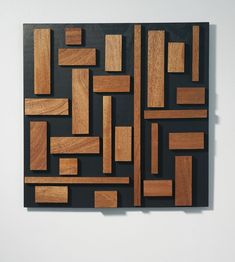 a piece of wood that has been cut into squares and rectangles on it