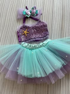 ⭐⭐Toddler Mermaid Inspired Purple Costume,Baby Girl Mermaid Outfit,Mermaid Tutu Romper,1st Birthday costume with Sequin Top,Cake Smash Outfit⭐⭐ 👉 Our costume is our own handmade product. The upper part of the costume is made of sequin fabric and the skirt part is made of tulle. Mermaid costume will make girls' colorful worlds even more colorful. You too can contribute to our costume design and make the mermaid costume even more unique. We welcome you to contact us for any suggestions, comments Ariel The Little Mermaid Tutu, Mermaid Infant Costume, Mermaid Costume Mommy And Me, Baby Mermaid Costumes, Purple Costume, Mermaid Birthday Outfit, Mermaid Birthday Decorations, Mermaid Tutu, Birthday Costume