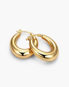 Elevate your style with our women's Dome Hoop Earrings in gold. This contemporary, yet classic, design features a polished finish and a 925 sterling silver post. These must-have hoop earrings exude sophistication and elegance.