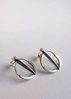 "Beautiful and elegant, these minimalist circle earrings are made from sterling silver, nickel free with white zircon setting on the top. Contemporary cocktail earrings, lightweight and comfortable. Earring Length : 2.5 cm / 0.9\" -Packed in labeled gift box. -Ships worldwide, handmade in Prague, Czech Republic. Please contact me with any questions by Etsy convo or by email: info [!at] vikamayzel.com" Cocktail Earrings, Earrings Circle, Prague Czech Republic, Prague Czech, Circle Studs, Modern Earrings, Silver Pieces, Circle Earrings, Stone Earrings