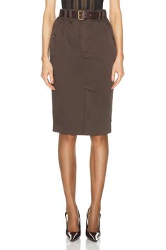 Find SAINT LAURENT Pencil Skirt In Army on Editorialist. Saint Laurent Pencil Skirt in Army 100% cotton. Made in Italy. Machine wash. Unlined. Button fly closure. 4-pocket design. Detachable belt is included. SLAU-WQ95. 793675-Y04VW-7073. About the designer: SAINT LAURENT has been influencing and revolutionizing the fashion industry since the debut of its iconic ‘Rive Gauche’ collection in 1966 - the couture house was the first to create a ready-to-wear capsule. The sleek, precisely tailored sta Chic Fitted Cotton Cargo Skirt, Fitted Cotton Cargo Skirt, Chic Knee-length Cotton Pencil Skirt, Relaxed Cotton Knee-length Cargo Skirt, Knee-length Relaxed Cotton Cargo Skirt, Cotton Lined Cargo Skirt For Work, Knee-length Cotton Pencil Skirt With Pockets, Cotton Knee-length Pencil Skirt With Pockets, Elegant Cotton Mini Pencil Skirt