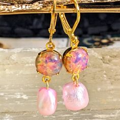 Here Is A Dangle/Drop Down Earrings Made With Czech Glass Pink Fire Opal Measurement: 8mm It Is Combined With: A Cultured Freshwater Pearl Dyed Pink. The Pearl Is Wonderfully Dyed And Present A Natural Look. For More Pink Fire Opal Pieces, Please Search Under This Title. The Base Material Is 18k Gold Plated. Please See My Other Listings For Baroque Pearls Combined With Crystals Or Gems, That Are Unique In Design. Elegant Pink Opal Jewelry For Formal Occasions, Elegant Formal Pink Opal Jewelry, Elegant Rose Gold Pink Opal Jewelry, Pink Teardrop Pearl Earrings For Formal Occasions, Elegant Pink Teardrop Pearl Earrings, Elegant Pink Opal Jewelry Gift, Elegant Pink Opal Jewelry For Gift, Pink Teardrop Pearl Drop Jewelry, Pink Round Pearl Earrings For Formal Occasions