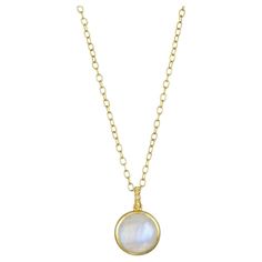 As ancient as the moon itself, the meaning of Moonstone lies within its energy. The pearly iridescence of this 18 Karat Gold Round Moonstone Pendant with its diamond bail evokes tranquility and exudes a glowing vitality. Worn alone or layered with other chains, this piece is sure to make a design statement. Moonstone: Round Moonstone Weight 20 Carats Diameter 21 mm Diamond Bail .13 tcw 18 Karat Gold Handmade Small Oval Link Chain: 2x3mm Length 21", adjustable Pendant and chain can be sold separa Elegant Moonstone Necklace With Moon Charm, Elegant Moonstone Jewelry With Pearl Pendant, Gold Moonstone Round Stone Jewelry, Yellow Gold Moonstone Necklace With Round Pendant, Gold Moonstone Jewelry With Round Stone, Elegant Moonstone Jewelry With Moon Charm, Elegant Moonstone Moon Charm Jewelry, Elegant Moon-shaped Necklace With Pearl Pendant, Elegant Moon-shaped Moonstone Jewelry