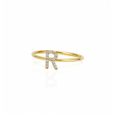 Whether you choose an initial just for her or multiple initials to represent family and children, these delicate rings can be worn alone or stacked together. Made from 14kt yellow gold, each ring is handcrafted in NYC by renowned jewelry designer, Sarah Chloe.    Available in ring size 6 or 7  Initial: 0.3" h  14kt yellow gold and optional  See Product Information for more details.  Imported  Monogramming is foil debossed. Elegant Yellow Gold Stackable Initial Ring, Elegant Sterling Silver Stackable Initial Ring, Elegant Personalized 14k Gold Stackable Rings, Luxury Yellow Gold Diamond Ring With Initials, Stackable Initial Ring In Yellow Gold And Sterling Silver, Stackable Sterling Silver Initial Ring In Yellow Gold, Yellow Gold Stackable Initial Ring In Sterling Silver, Gold Stackable Rings With Initials, Yellow Gold Sterling Silver Stackable Initial Ring