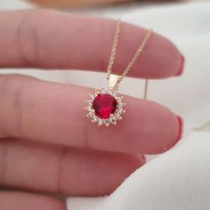 10k 14k 18k Solid Gold Round Cut Ruby Necklace, Gemstone Halo Necklace For Mom, July Birthstone Necklace For Birthday Gift, Christmas Gift This necklace is handmade and produced with 10k 14k 18k solid gold according to your preference. Gold Color : Yellow Gold, White Gold, Rose Gold Pendant size: Heigth : 0.39 inches ( 10 mm ) Width: 0.39 inches ( 10 mm ) Gemstone : 6 mm Round Cut, Lab-Created Ruby Additional Stones : Cubic Zirconia We have 3 Types solid gold chain options: Type1 Chain (0.85mm t Gold Plated Fine Jewelry Birthstone Pendant Necklace, Gold Plated Birthstone Pendant Necklace, Gold Plated Pendant Birthstone Necklace In Fine Jewelry Style, Gold Plated Pendant Birthstone Necklace, Fine Jewelry Ruby Gift, White Gold Ruby Jewelry Gift, Dazzling Rose Gold Necklace For Gift, Dazzling Rose Gold Necklace Gift, Fine Jewelry Necklace With Prong Setting For Valentine's Day