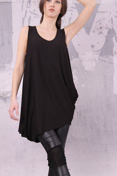 Asymmetrical black sleeveless tunic top, loose tunic, tank top - UM-020-VL Asymmetrical Solid Stretch Tank Top, Asymmetrical Stretch Tank Top, Chic Oversized Sleeveless Top, Casual Asymmetrical Tank Top For Summer, Trendy Asymmetrical Hem Tank Top For Spring, Summer Lagenlook Tunic, Versatile Black Tank Top For Layering, Black Stretch Top With Asymmetrical Hem, Asymmetrical Solid Color Tank Top For Summer