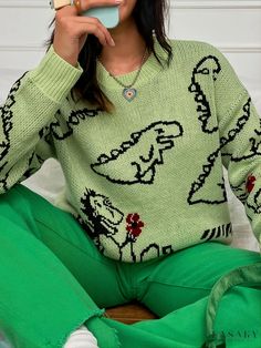 Lasaky - Womens Crew Neck Long Sleeve Knit Sweater with Casual Cartoon Dinosaur Pattern, Loose Fit - Ideal for Fashionable Fall and Winter Attire. Casual Cartoon Print Sweater, Casual Dinosaur Print Tops For Fall, Cute Green Knitted Sweater, Green Dinosaur Print Tops For Spring, Green Dinosaur Print Top For Spring, Green Acrylic Casual Sweater, Winter Attire, Dinosaur Pattern, Cartoon Dinosaur