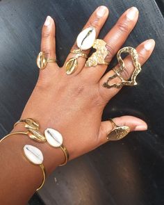 *Casting brass rings price is for 5 rings and 2 bracelets made of brass and cowrie shell as attached  *Shipping through dhl Express  *They are handmade  *adjustable  *wholesale prices available Cowrie Ring, Dope Jewelry Accessories, Detail Oriented, Earthy Jewelry, Brass Rings, Spirited Art, 5 Rings, Dope Jewelry, Boho Diy