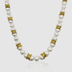 If it's not the real deal, it's not CRAFTD. This necklace showcases 18K Gold Double Crowns, hand-threaded alongside all-natural freshwater pearls. Each pearl is unique and sourced directly from Mother Nature, making it a one-of-a-kind addition to your collection. With its premium lobster clasp and adjustable length, customization is effortless. Wear it solo as a statement piece, or pair it effortlessly with the matching Crown Jewels Pearl Bracelet for a cohesive look. ✓ Real Freshwater Pearls✓ 1 Yellow Gold Baroque Pearl Single Strand Necklace, Gold Akoya Pearl Beaded Necklace, Luxury Adjustable Pearl Necklace, Gold Hand-strung Pearl Necklace With Round Beads, Gold Hand-strung Pearl Necklace For Gift, Gold Pearl Necklace Gift, Elegant Gold Hand-strung Pearl Necklace, Elegant Hand-strung Gold Pearl Necklace, Luxury Gold Hand-strung Necklaces