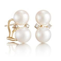 Stacked freshwater pearl earrings embellished with diamonds. Since 1861, Gump's has been a destination for jewelry that is distinctive and timeless. To ensure each piece is created to our exacting standards, our expert in-house jewelry team oversees every step of the production process. The result is a statement of pure elegance. Freshwater cultured pearls, 9mm. Diamonds, 0.20ctw. 14-karat yellow gold. Clip or pierced. 3/4" long. Luxury Pearl Diamond Earrings With Diamond Accents, Luxury Pearl Diamond Earrings, Luxury Akoya Pearl Drop Diamond Earrings, Timeless Akoya Pearl Earrings With Diamond Accents, Stacked Pearl Earrings, Freshwater Pearl Earrings, Pure Elegance, Freshwater Pearls Earrings, Freshwater Cultured Pearls