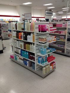 an aisle in a store filled with lots of products